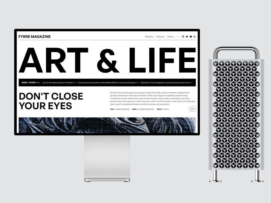 A magazine website on an iMac with the tower standing next to it. The title 'Art & Life' is seen in bold uppercase on the screen